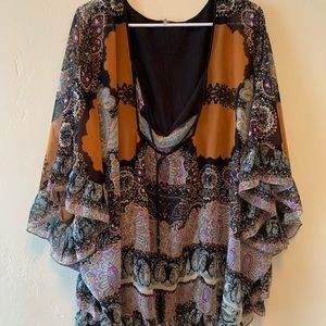 Flowy top or Swim cover up from Free People.